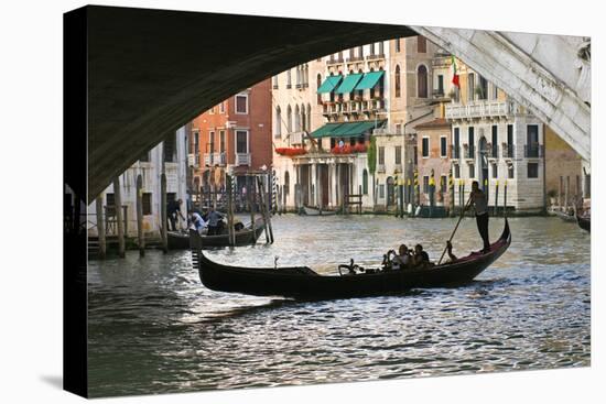 Tourist in a Gondola as They Pass under the Rialto Bridge, Venice, Italy-David Noyes-Premier Image Canvas