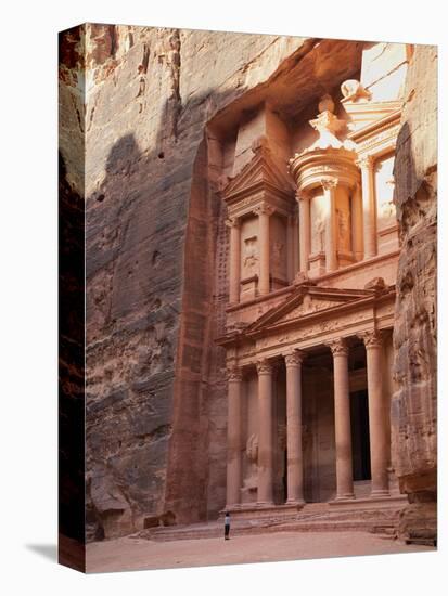 Tourist Looking Up at the Facade of the Treasury (Al Khazneh) Carved into the Red Rock at Petra, UN-Martin Child-Premier Image Canvas