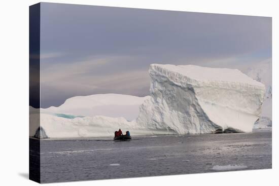 Tourists exploring Skontorp Cove in inflatable boat, Paradise Bay, Antarctica, Polar Regions-Sergio Pitamitz-Premier Image Canvas