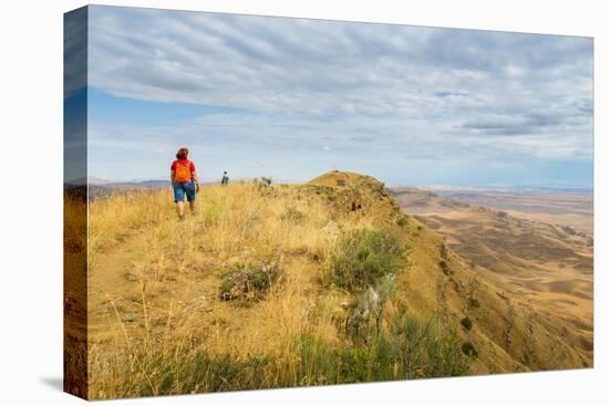 Tourists hiking along the border between Georgia and Azerbaijan near David Gareji Monastery, Udabno-Jan Miracky-Premier Image Canvas