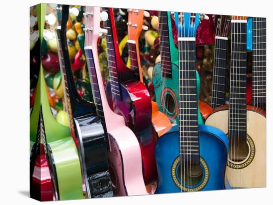 Toy Guitars, Olvera Street Market, El Pueblo de Los Angeles, Los Angeles, California, USA-Walter Bibikow-Premier Image Canvas