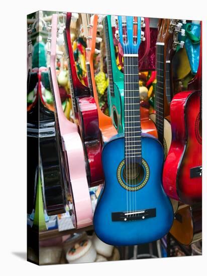 Toy Guitars, Olvera Street Market, El Pueblo de Los Angeles, Los Angeles, California, USA-Walter Bibikow-Premier Image Canvas