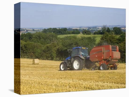 Tractor Collecting Hay Bales at Harvest Time, the Coltswolds, England-David Hughes-Premier Image Canvas