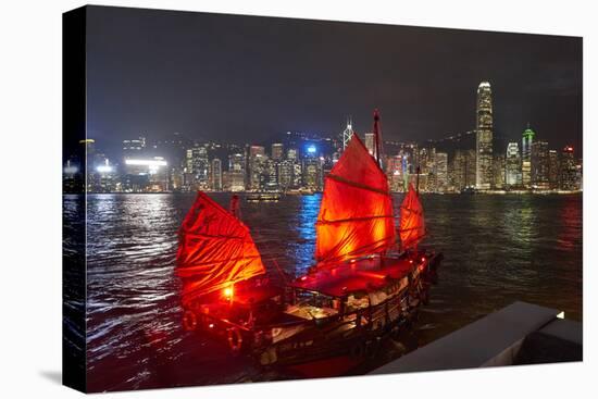 Traditional Chinese junk boat for tourists on Victoria Harbour illuminated at night, Hong Kong, Chi-Fraser Hall-Premier Image Canvas