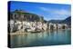 Traditional fishing boats and fishermens houses, Cefalu, Sicily, Italy, Europe-Marco Simoni-Premier Image Canvas