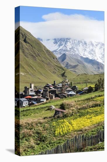 Traditional medieval Svanetian tower houses, Ushguli village, Shkhara Moutains behind, Svaneti regi-G&M Therin-Weise-Premier Image Canvas