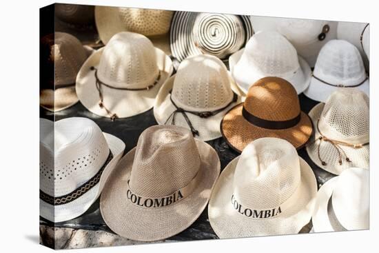 Traditional Panama hats for sale at a street market in Cartagena, Colombia, South America-Alex Treadway-Premier Image Canvas