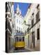 Tram (Electricos) Along Rua Das Escolas Gerais with Tower of Sao Vicente de Fora, Lisbon, Portugal-Stuart Black-Premier Image Canvas