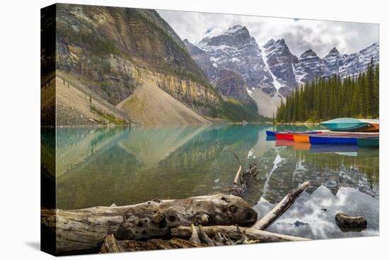 Tranquil setting of rowing boats on Moraine Lake, Banff National Park, UNESCO World Heritage Site, -Frank Fell-Premier Image Canvas