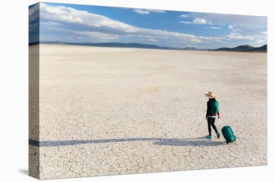 Traveler Rolls A Carry-On Suitcase, The Playa In The Alvord Desert Of SE Oregon-Ben Herndon-Premier Image Canvas