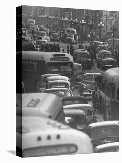 Traveling Through Rush Hour Traffic in Downtown Los Angeles-Loomis Dean-Premier Image Canvas