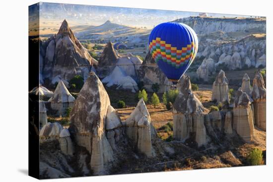 Turkey, Anatolia, Cappadocia, Goreme. Hot air balloons flying above the valley.-Emily Wilson-Premier Image Canvas