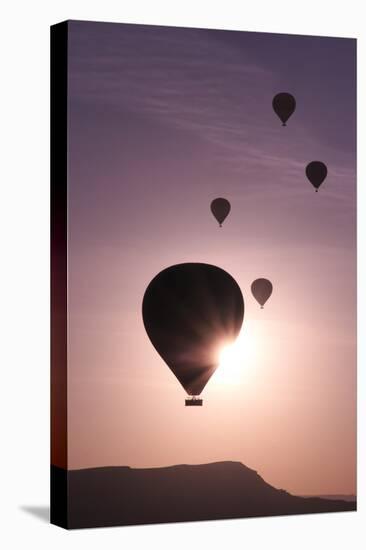 Turkey, Anatolia, Cappadocia, Goreme. Hot air balloons flying above the valley.-Emily Wilson-Premier Image Canvas