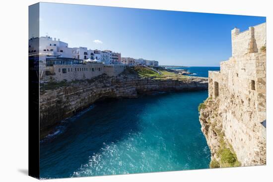 Turquoise sea framed by the old town perched on the rocks, Polignano a Mare, Province of Bari, Apul-Roberto Moiola-Premier Image Canvas