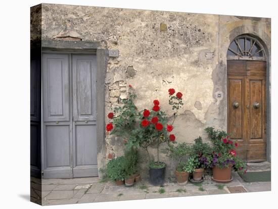 Tuscan Doorway in Castellina in Chianti, Italy-Walter Bibikow-Premier Image Canvas