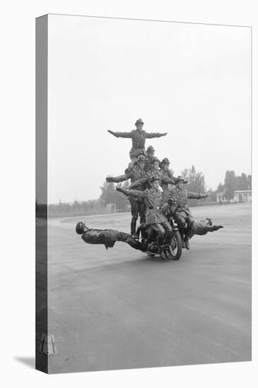 Twelve Policemen Riding One Motorcycle-null-Premier Image Canvas