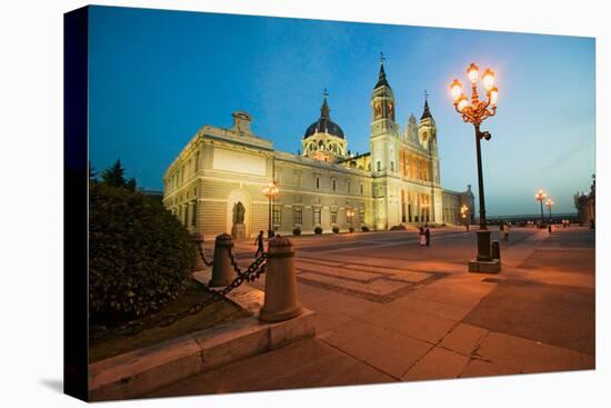 Twilight and lights coming on at Royal Palace in Madrid, Spain-null-Premier Image Canvas