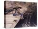 Two Boys Fishing Off of Bridge-Nora Hernandez-Premier Image Canvas