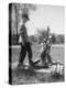 Two Boys Getting Water from a Pump at Rural School-Thomas D^ Mcavoy-Premier Image Canvas