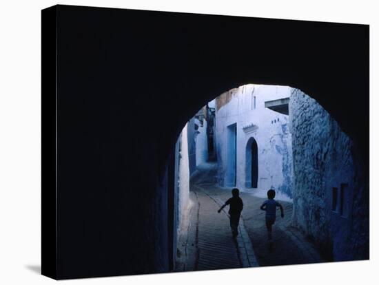 Two Boys Running Through Kasbah, Chefchaouen, Morocco-Jeffrey Becom-Premier Image Canvas