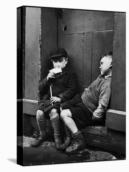 Two Boys Sitting on Doorstep-Nat Farbman-Premier Image Canvas