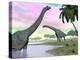 Two Brachiosaurus Dinosaurs in Landscape with Water and Palm Trees-null-Stretched Canvas