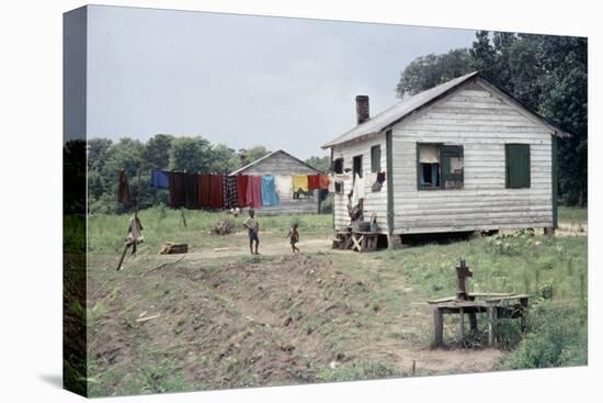 Two Children Stand in a Yard under a Laundry Line, Edisto Island, South Carolina, 1956-Walter Sanders-Premier Image Canvas