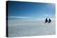 Two Cyclists Cycle in the Morning over the Salar De Uyuni-Alex Saberi-Premier Image Canvas