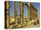 Two Cyclists Pass the Great Colonnade (Cardo), Palmyra, Unesco World Heritage Site, Syria-Eitan Simanor-Premier Image Canvas