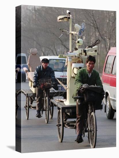 Two Delivery Riders Carry a Dentists Drill and Chair Along a Beijing Street January 4-null-Premier Image Canvas