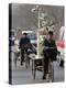 Two Delivery Riders Carry a Dentists Drill and Chair Along a Beijing Street January 4-null-Premier Image Canvas