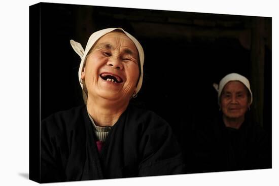 Two Dong Women, One Laughing, in a Dark Room, Sanjiang Dong Village, Guangxi, China-Enrique Lopez-Tapia-Premier Image Canvas