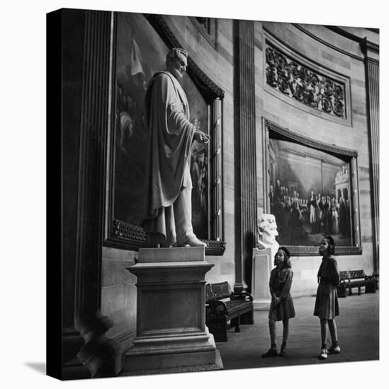 Two Girl Scouts Looking Up at Marble Statue of Abraham Lincoln, Rotunda of the Capitol Building-Alfred Eisenstaedt-Premier Image Canvas