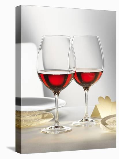 Two Glasses of Red Wine on Festive Table-Alexander Feig-Premier Image Canvas