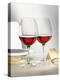 Two Glasses of Red Wine on Festive Table-Alexander Feig-Premier Image Canvas