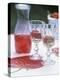 Two Glasses of Strawberry Wine on a Table in the Garden-Alena Hrbkova-Premier Image Canvas