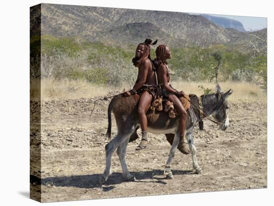 Two Happy Himba Girls Ride a Donkey to Market, Namibia-Nigel Pavitt-Premier Image Canvas