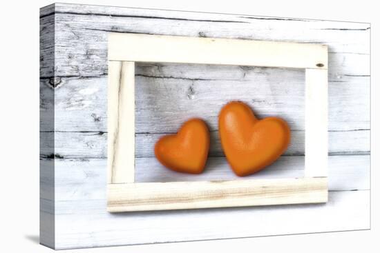 Two Hearts Made of Stone in Picture Frame-Uwe Merkel-Premier Image Canvas