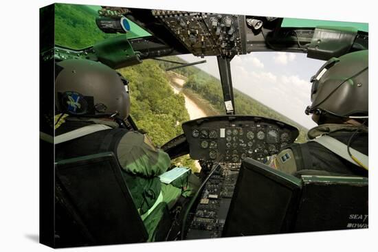 Two Instructor Pilots Practice Low Flying Operations in a Uh-1H Huey Helicopter-null-Premier Image Canvas