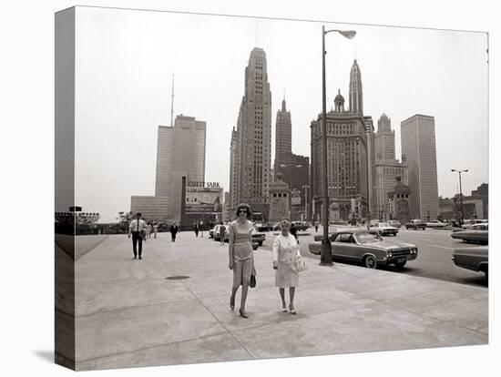 Two Ladies Walking the Sidewalk Skyscrapers in Chicago America's Windy City, in the 1960s-null-Premier Image Canvas