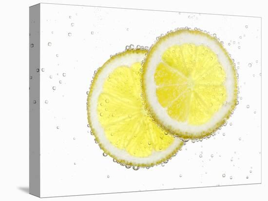 Two Lemon Slices in Water with Air Bubbles-Kröger & Gross-Premier Image Canvas