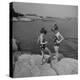 Two Little Girls Modelling Sun Dot Bathing Suits While Playing on the Rocks-Nina Leen-Premier Image Canvas