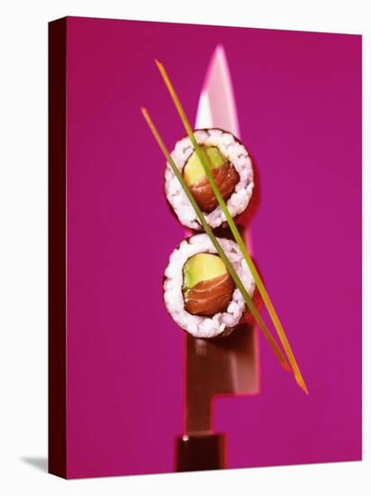 Two Maki-Sushi with Avocado and Salmon on Knife-Hartmut Kiefer-Premier Image Canvas