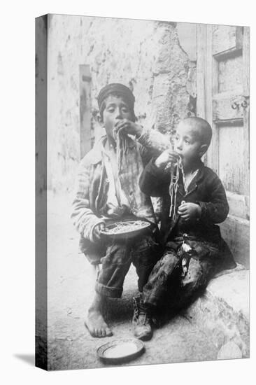 Two Neapolitan Children Slurp Down Spaghetti-null-Stretched Canvas