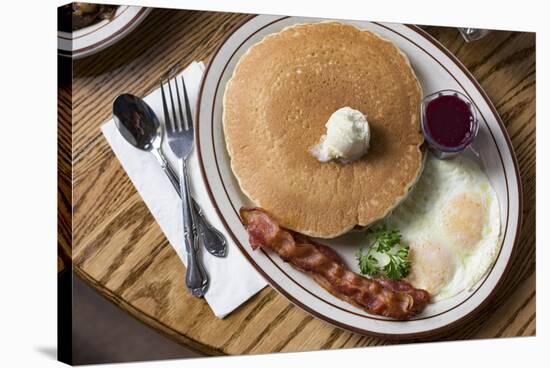 Two Pancakes And Eggs Served With Bacon At The Firesign Cafe In Tahoma, CA, Shores Of Lake Tahoe-Shea Evans-Stretched Canvas