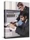 Two Technicians Check a Computer Printout-Heinz Zinram-Premier Image Canvas