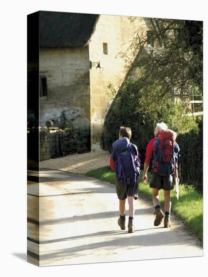 Two Walkers with Rucksacks on the Cotswold Way Footpath, Stanton Village, the Cotswolds, England-David Hughes-Premier Image Canvas