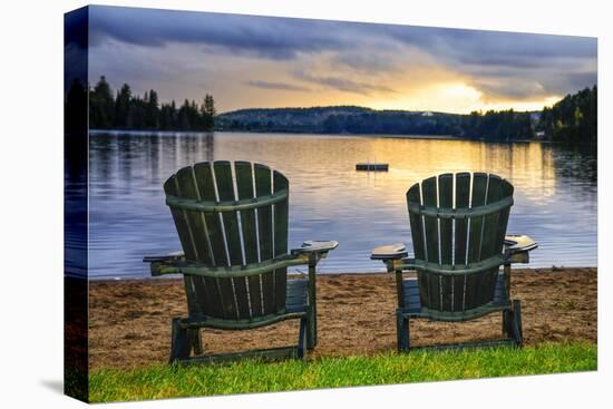 Two Wooden Chairs on Beach of Relaxing Lake at Sunset. Algonquin Provincial Park, Canada.-elenathewise-Premier Image Canvas