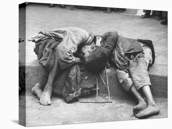 Two Young Children Dying Together in Gutter During Famine, Unable to Get Enough Food from Begging-George Silk-Premier Image Canvas