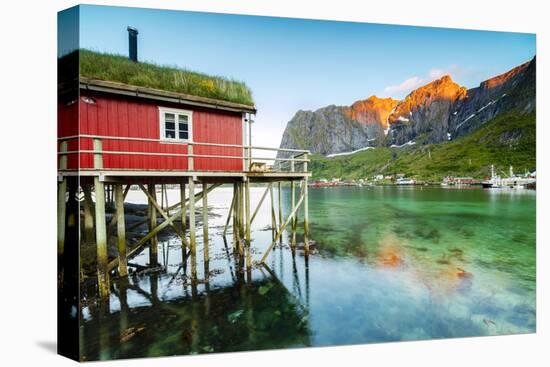 Typical House of Fishermen Called Rorbu Lit Up by Midnight Sun, Reine, Nordland County-Roberto Moiola-Premier Image Canvas